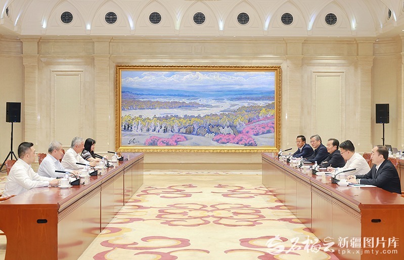 陈小江会见马来西亚—中国商务理事会主席卢成全